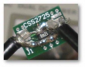Figure 1, A 250uOhm current sense resistor is mounted with RG58 coax soldered directly to the resistor for measurement