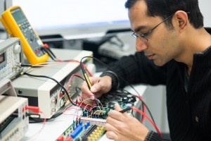 Rachit Mohan with his sensor readout chip made in 40nm CMOS, operating with a time-based technique.
